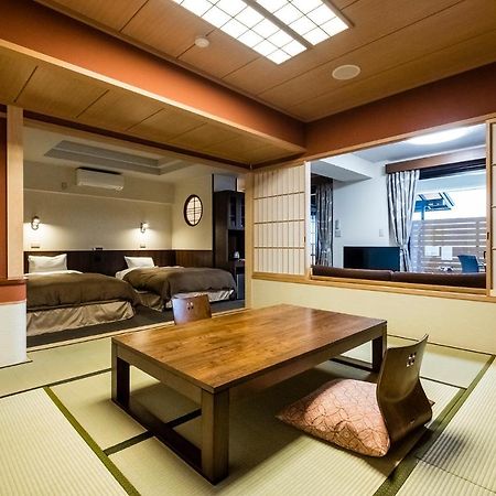 Hotel New Tomiyoshi à Atami  Extérieur photo