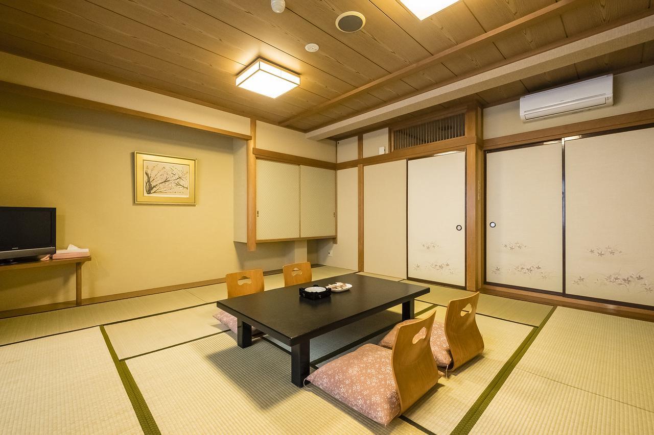 Hotel New Tomiyoshi à Atami  Extérieur photo