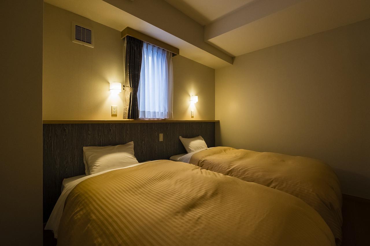 Hotel New Tomiyoshi à Atami  Extérieur photo