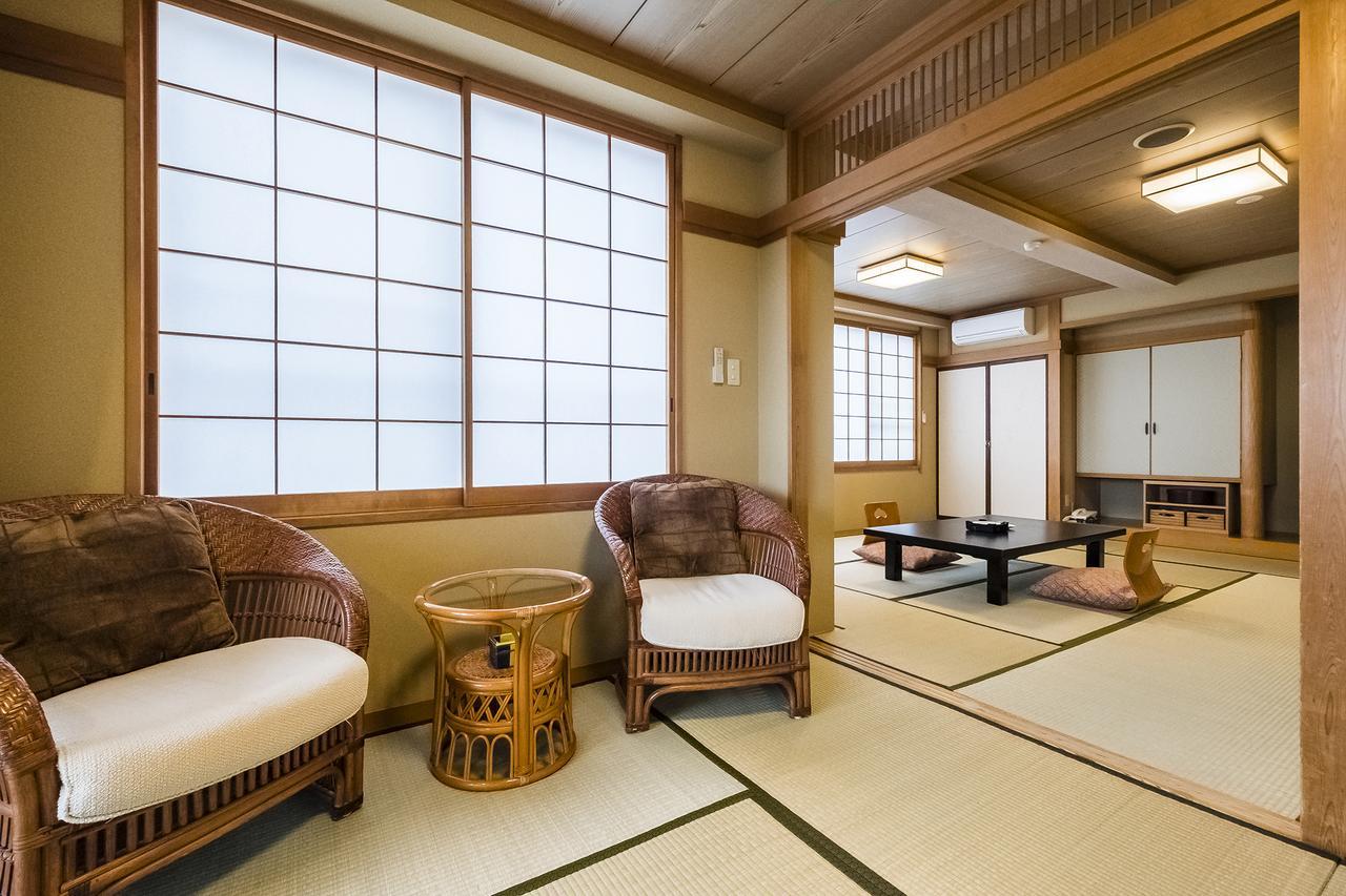Hotel New Tomiyoshi à Atami  Extérieur photo