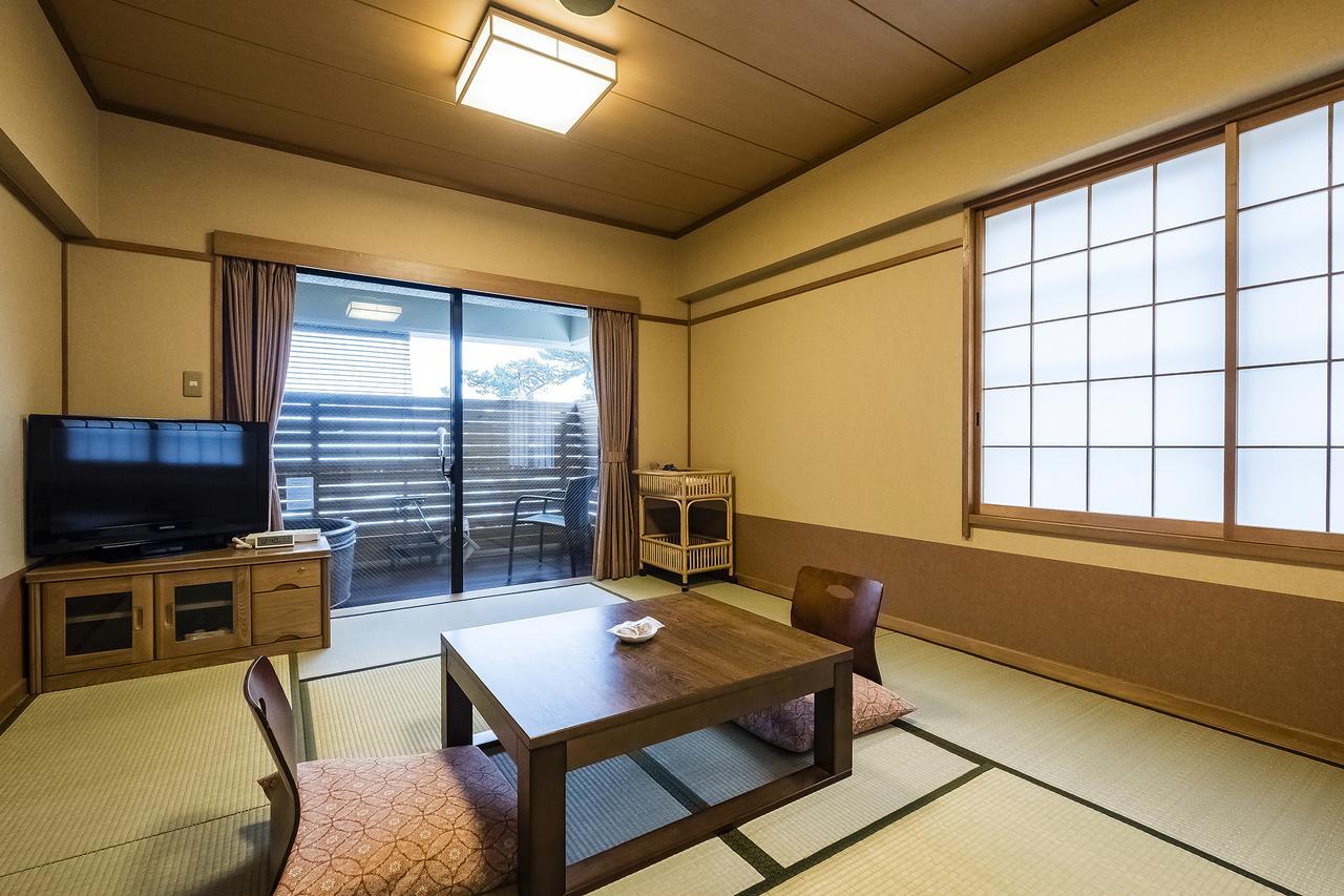 Hotel New Tomiyoshi à Atami  Extérieur photo