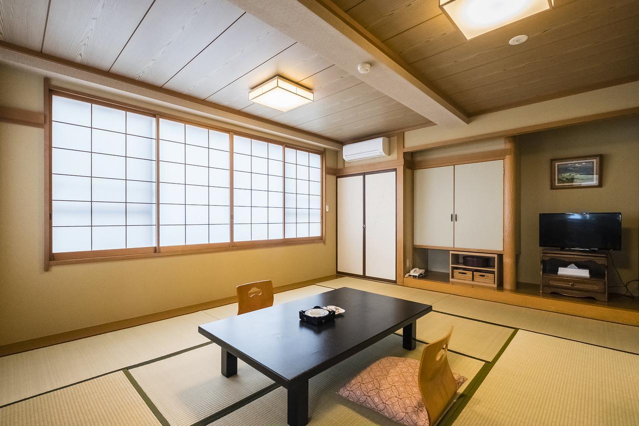 Hotel New Tomiyoshi à Atami  Extérieur photo